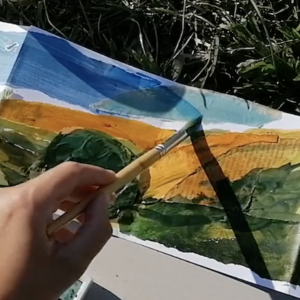 Make and fill a concertina sketchbook with landscape collages and paintings.