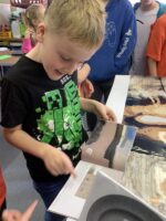 Children Looking At Artists Work by Natalie Deane