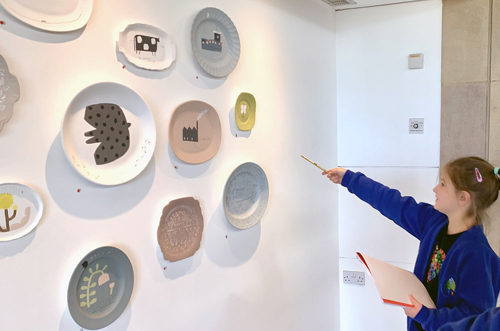 Pointing at Plates by Natalie Deane
