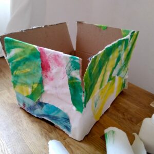 A decorated cardboard box.