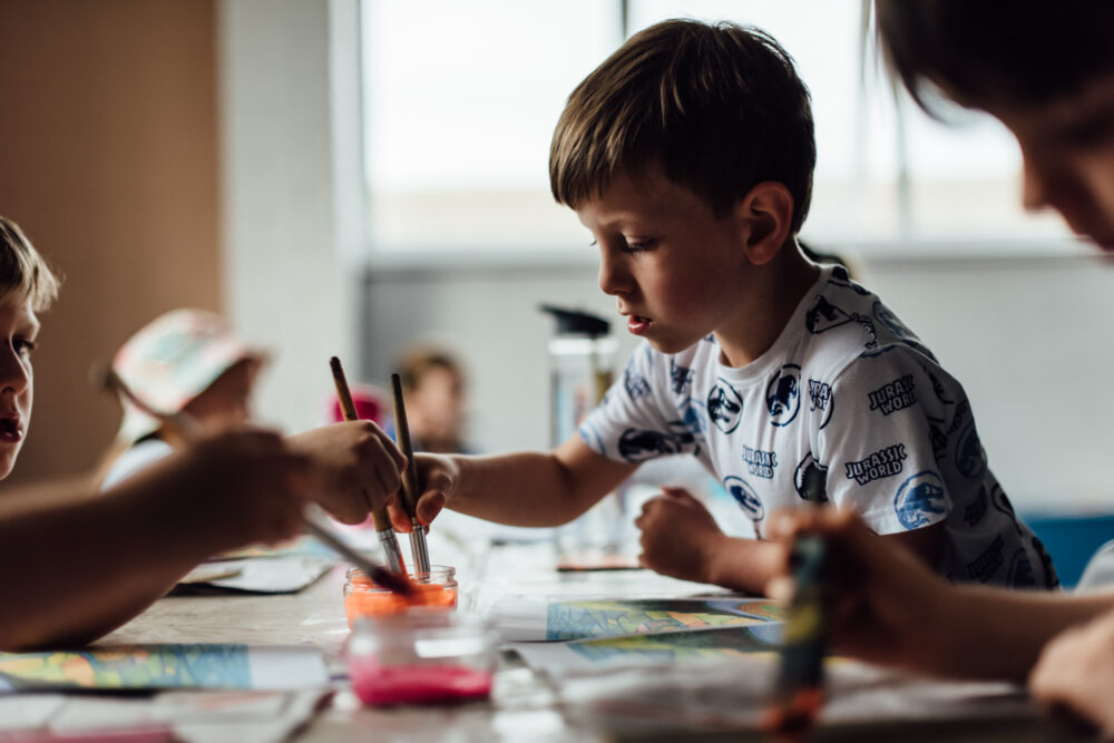 A group of children painting