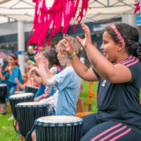 A group of children drumming