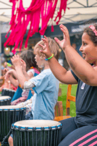 A group of children drumming
