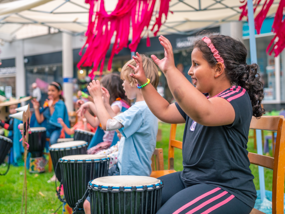A group of children drumming