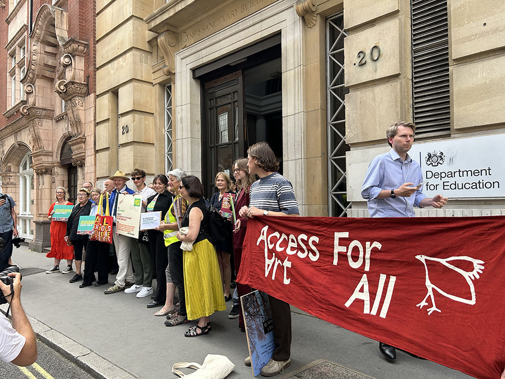 out and about with the AccessArt Banner: "AccessArt for All" at the DfE